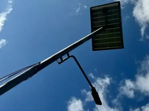 Solar Panel Street Light Against Blue Sky